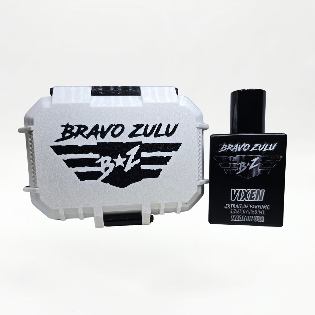 Bravo Zulu VIXEN Extrait de Parfum by Flagship Soap Company displayed side by side with its closed white rugged tactical case featuring the black BRAVO ZULU B★Z winged logo, on a clean white studio background.