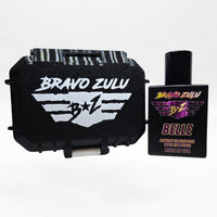Bravo Zulu BELLE Extrait de Parfum by Flagship Soap Company displayed side by side with its closed black rugged tactical case featuring the white BRAVO ZULU B★Z winged logo, on a clean white studio background.