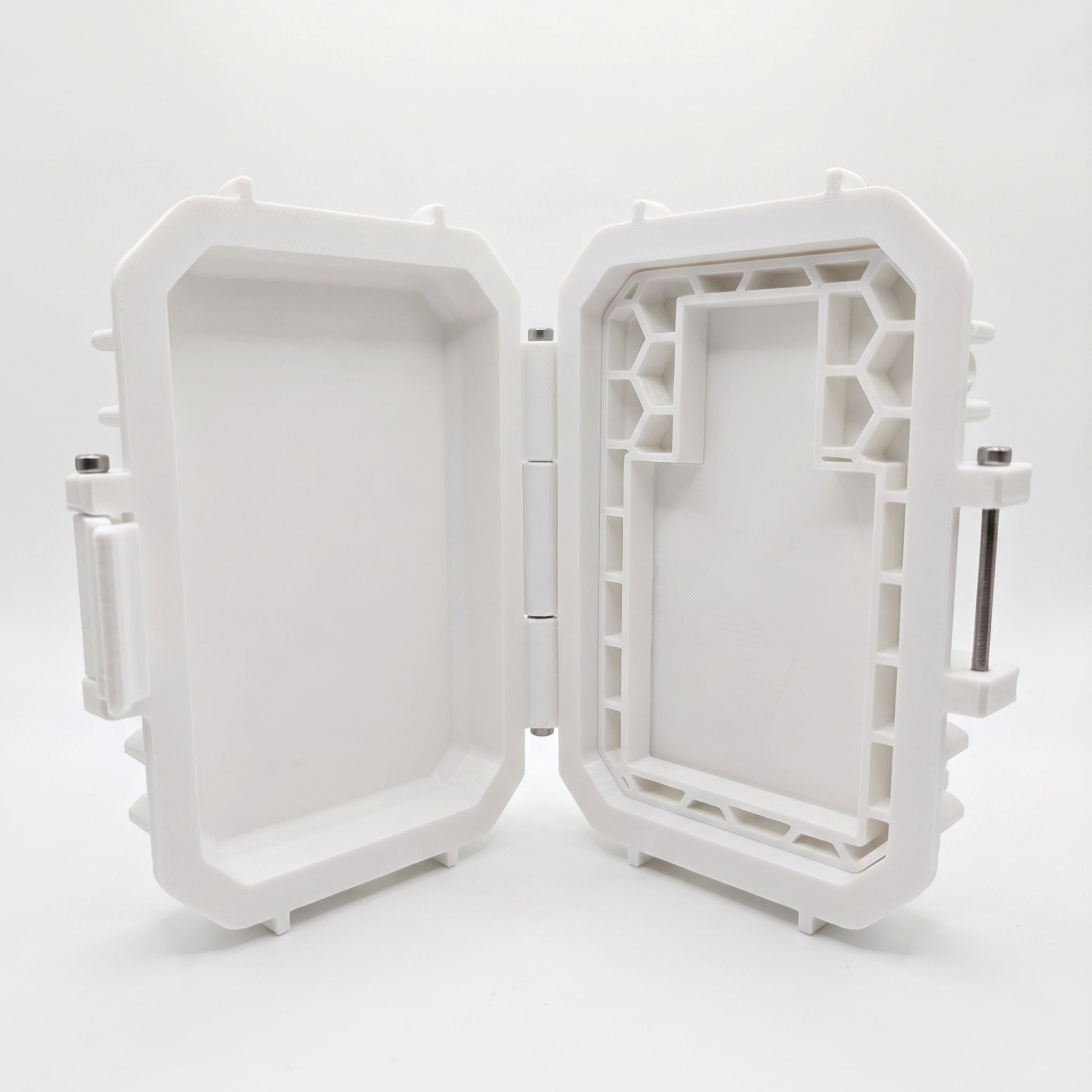 Front studio product shot of the open, empty white custom tactical case for Bravo Zulu NARC Extrait de Parfum cologne, isolated on a seamless white background. The rugged protective hardware case is open at an angle, clearly showing the internal molded layout and honeycomb grid structure engineered to lock the matte black glass bottle securely into place for travel.