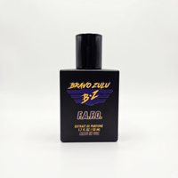 Centered studio product shot of F.A.F.O. Extrait de Parfum cologne by Flagship Soap Company. The heavy, tactical matte black glass bottle is shown from a straight-on perspective, highlighting the high-contrast purple and yellow Bravo Zulu BZ logo, gold F.A.F.O. branding, and product specifications for the true 30% concentration fragrance oils. The bottle stands alone, isolated on a seamless, clean white background to deliver an elite e-commerce presentation.