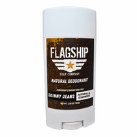 Front of product: Skinny Jeans Natural Deodorant with an earthy, stylish design.