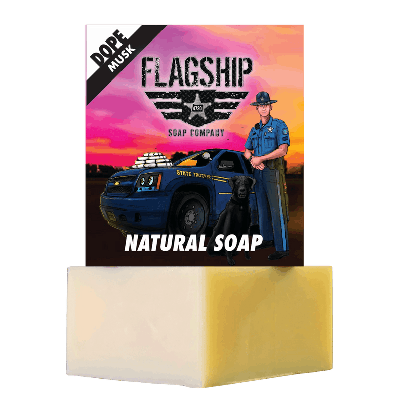 Picture of Flagship Soap Company Natural Soap Dope with a bar of soap and the front of the soap box with an artist rendition of Oregon State Trooper Greg Walker and his K9 partner