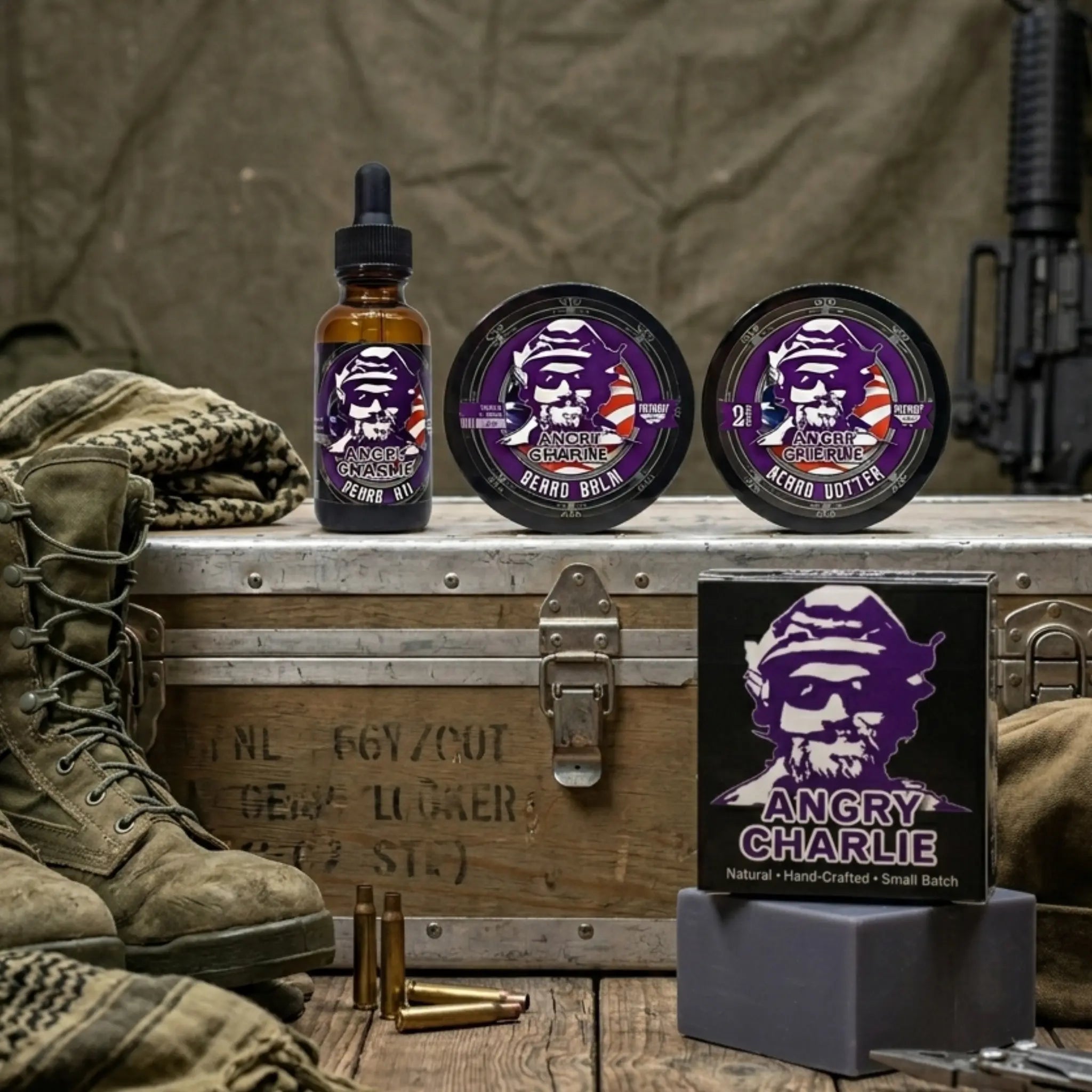 Flagship Soap Company Angry Charlie product line, including beard oil, balm, butter, and bar soap, displayed on a vintage military footlocker with combat boots and an AR-15.