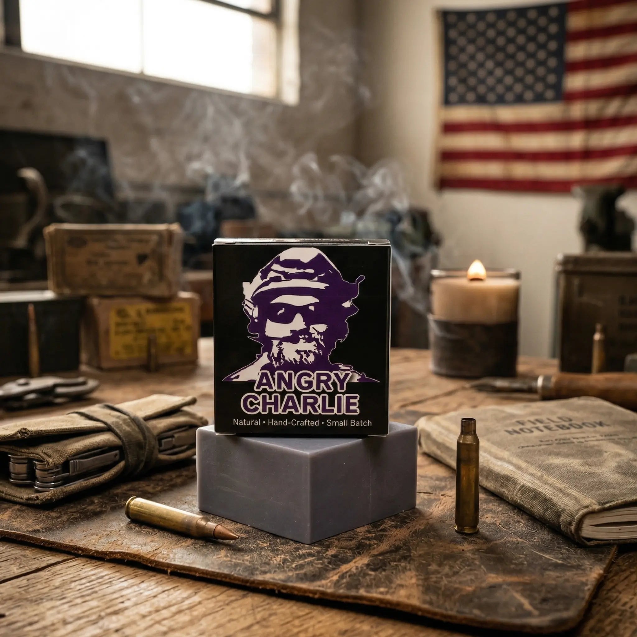 Angry Charlie natural soap bar with cedarwood and vanilla scent. Veteran-made small-batch men's soap on a rustic workshop table with patriotic branding.