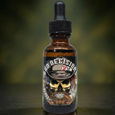 Bad Decisions Beard Oil by Patriot Beard Co. Label shows a skull with a fedora, playing cards, and a cigar. Scented with notes of rich tobacco and bourbon, designed for the man who lives by his own rules.