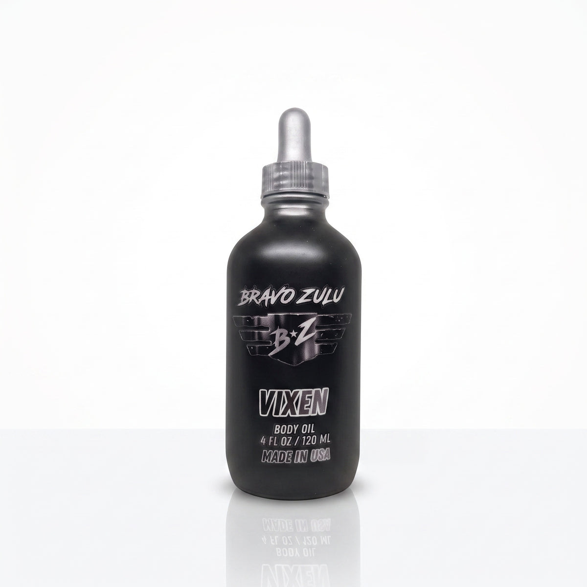 Bravo Zulu Vixen Body Oil dropper bottle product shot, matte black glass with silver Bravo Zulu B★Z logo