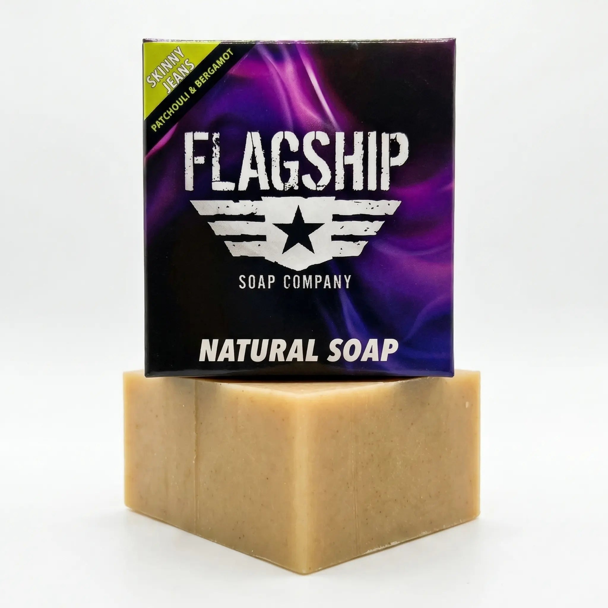 Professional studio shot of Skinny Jeans natural soap by Flagship Soap Company, featuring an earthy scent profile of patchouli, cedarwood, and bergamot.