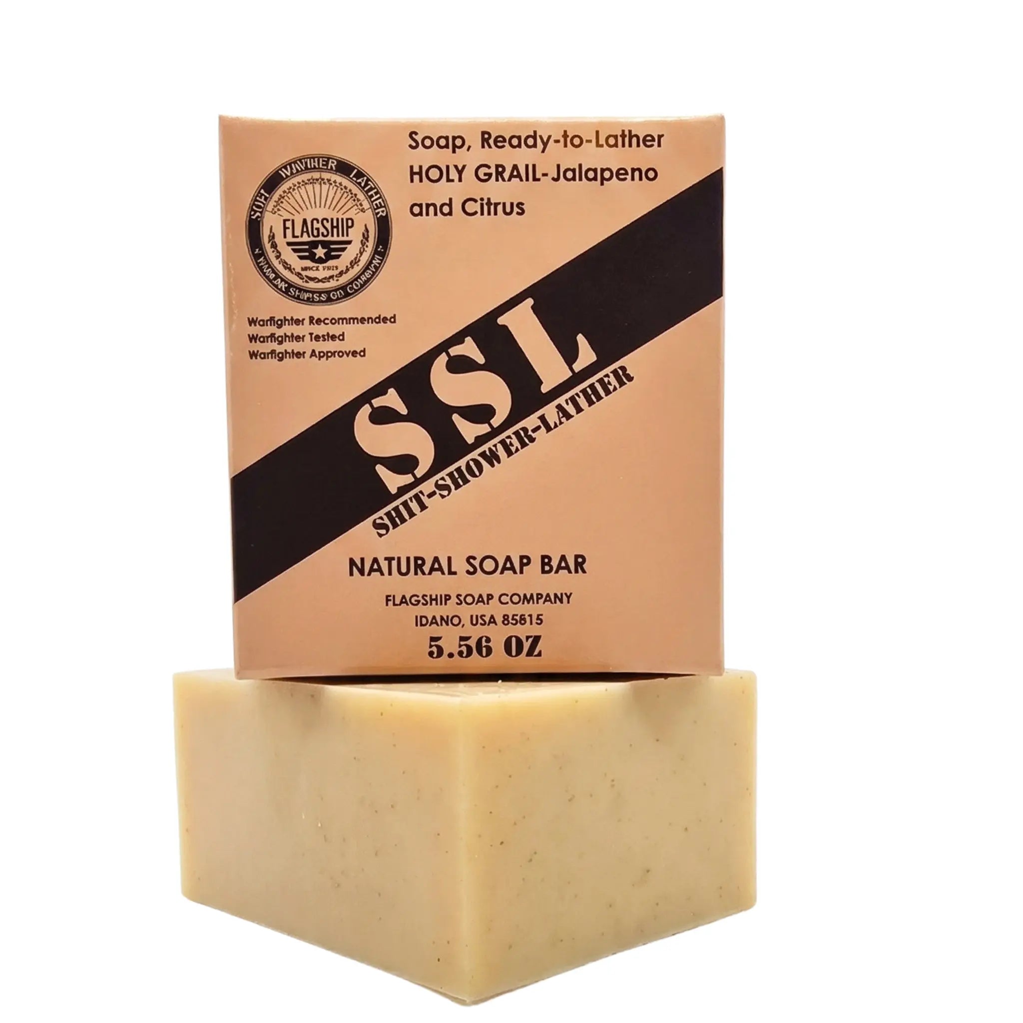 The Holy Grail Natural Soap by Flagship Soap Company in Jalapeno and Citrus scent, unboxed and stacked. The packaging is a direct nod to military Meals Ready to Eat (MRE), featuring tan cardstock with a black diagonal stripe, bold "SSL" lettering, and the weight marked as 5.56 OZ. This "Soap, Ready-to-Lather" is labeled as "Warfighter Recommended," making it a perfect gift for a veteran or active duty service member who appreciates MRE themed gear.