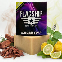 Flagship Soap Company Skinny Jeans natural bar soap featuring patchouli, bergamot, and cedarwood essential oils, displayed with raw cedar wood and fresh bergamot.
