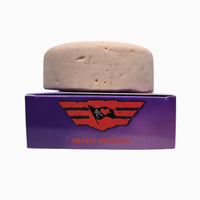 Smooth Operator natural beard wash puck stacked on Flagship Soap Company box
