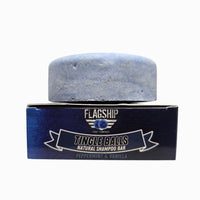 Tingle Balls natural beard wash puck stacked on Flagship Soap Company box