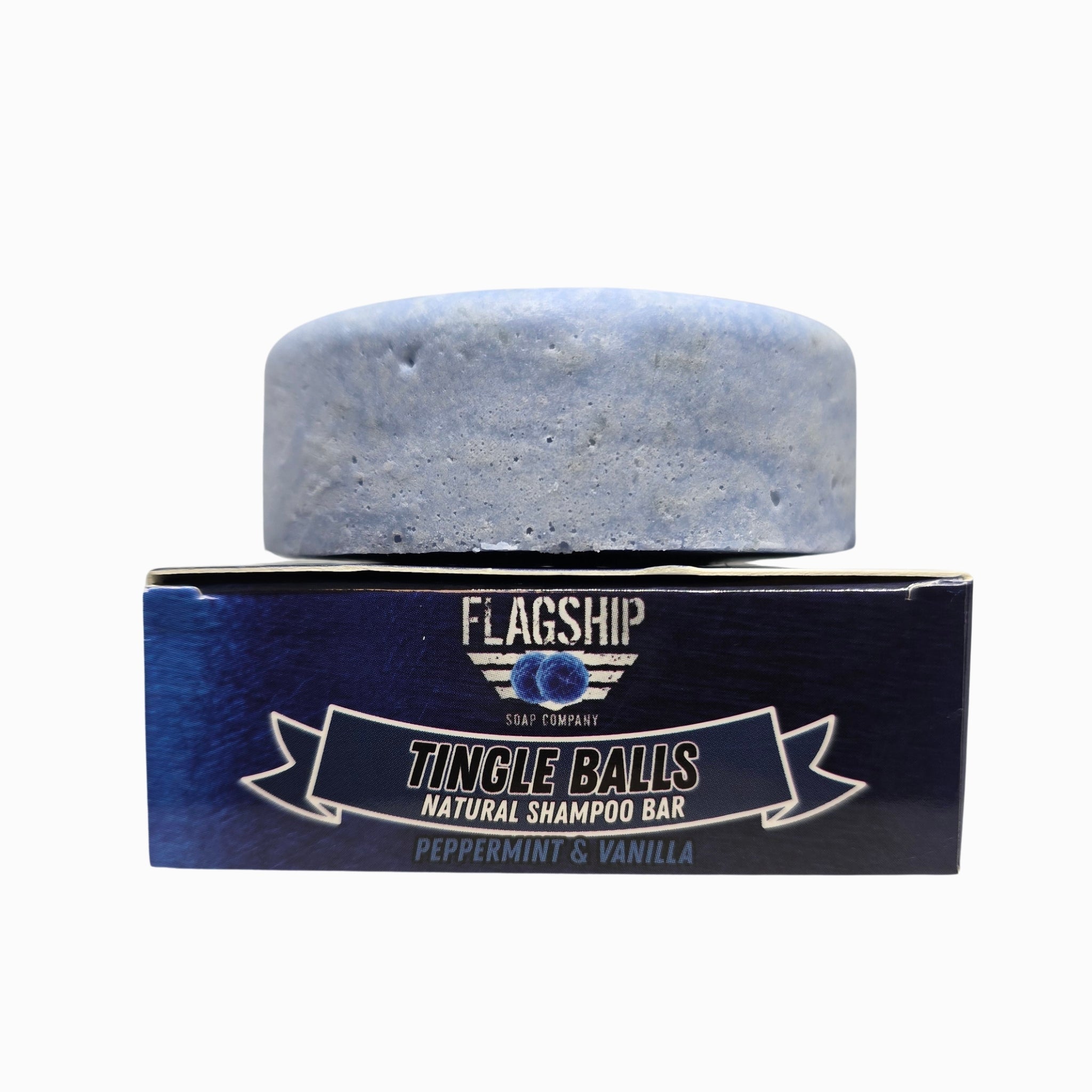 Tingle Balls natural beard wash puck stacked on Flagship Soap Company box