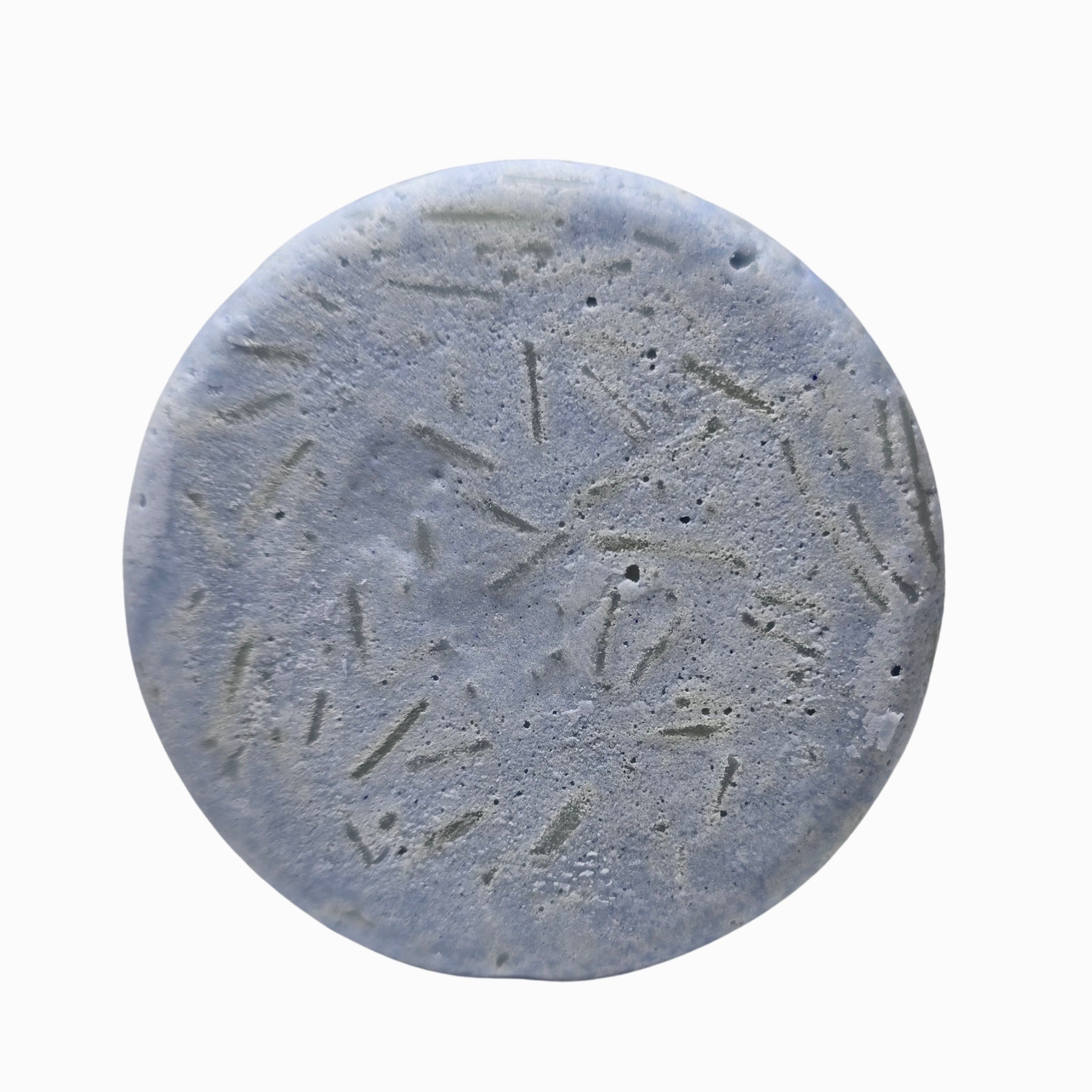 Close-up of Tingle Balls peppermint and vanilla natural beard wash puck texture