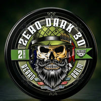Zero Dark 30 Military-themed Beard Balm (2 oz). Label features a bearded skull wearing a tactical army green helmet with ammunition tucked in the band, set against a camo and American flag backdrop. Proudly Veteran-owned and operated grooming gear.